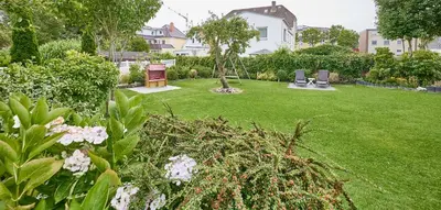Ein Garten an der Unterkunft Haus Mühlentrift Döse