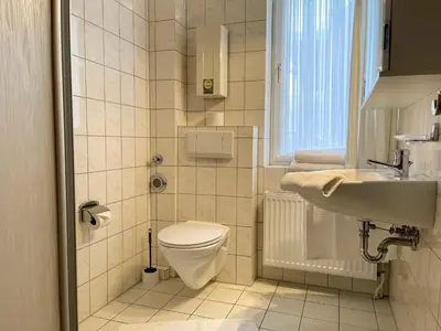 Ein Badezimmer in der Unterkunft Haus Nordseeperle Fewo Nr. 4