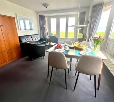 Ein Sitzbereich in der Unterkunft Haus Nordseeperle Fewo Nr. 8