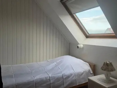Ein Bett oder Betten in einem Zimmer der Unterkunft Meeresbrandung, Ferienwohnung 55