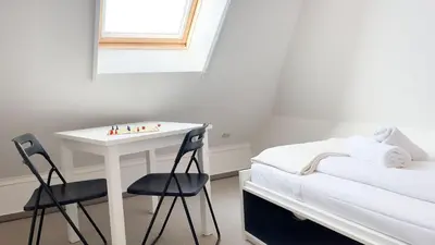 Ein Bett oder Betten in einem Zimmer der Unterkunft strandnahe Ferienwohnung mit zwei sep. Schlafzimmern