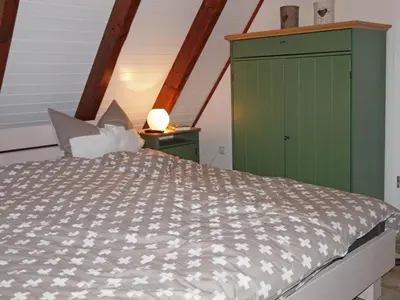 Ein Bett oder Betten in einem Zimmer der Unterkunft Haus Pelle