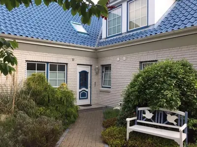 Ein Garten an der Unterkunft Haus Weisse Möwe, Whg 2