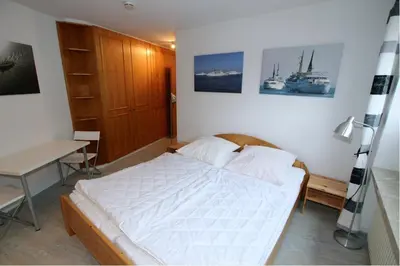 Ein Bett oder Betten in einem Zimmer der Unterkunft Strand-Villa, Helgoland
