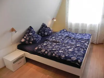 Ein Bett oder Betten in einem Zimmer der Unterkunft Strandrose