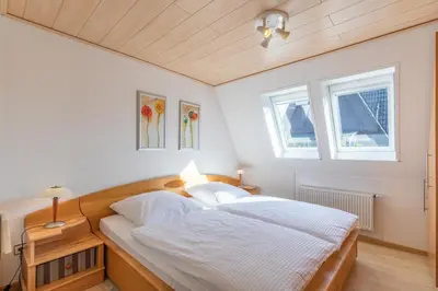 Ein Bett oder Betten in einem Zimmer der Unterkunft Seegras