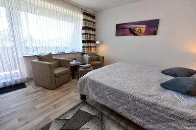 Ein Bett oder Betten in einem Zimmer der Unterkunft Haus 