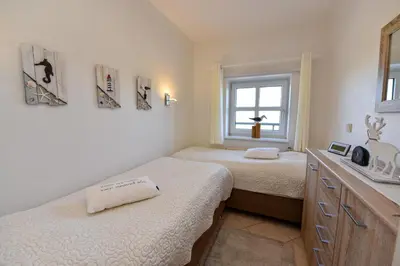 Ein Bett oder Betten in einem Zimmer der Unterkunft 