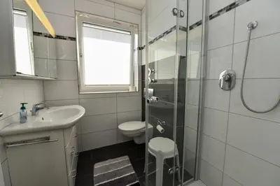 Ein Badezimmer in der Unterkunft 