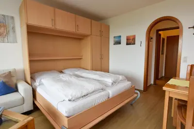 Ein Bett oder Betten in einem Zimmer der Unterkunft Haus 