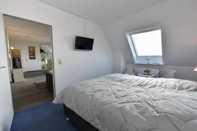 Ein Bett oder Betten in einem Zimmer der Unterkunft 
