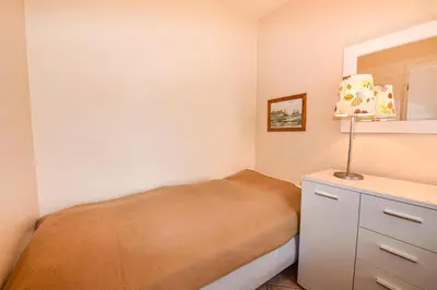 Ein Bett oder Betten in einem Zimmer der Unterkunft 