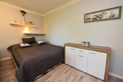 Ein Bett oder Betten in einem Zimmer der Unterkunft 