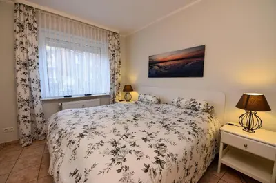 Ein Bett oder Betten in einem Zimmer der Unterkunft Haus 