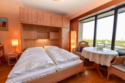 Ein Bett oder Betten in einem Zimmer der Unterkunft Haus 