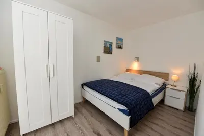 Ein Bett oder Betten in einem Zimmer der Unterkunft Appartementhaus 