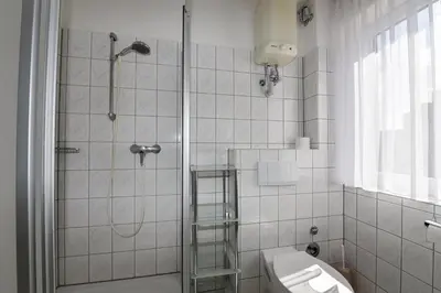 Ein Badezimmer in der Unterkunft 