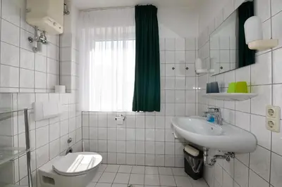 Ein Badezimmer in der Unterkunft 
