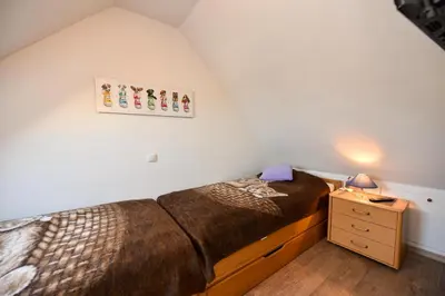 Ein Bett oder Betten in einem Zimmer der Unterkunft 