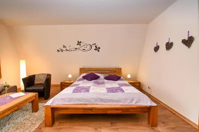 Ein Bett oder Betten in einem Zimmer der Unterkunft Haus 