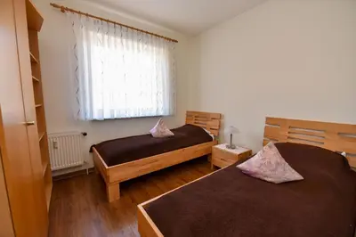 Ein Bett oder Betten in einem Zimmer der Unterkunft Haus 