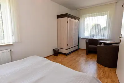 Ein Bett oder Betten in einem Zimmer der Unterkunft Haus 