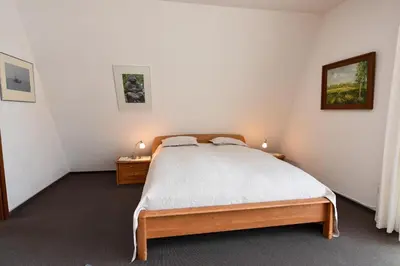 Ein Bett oder Betten in einem Zimmer der Unterkunft Haus 