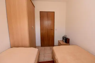 Ein Bett oder Betten in einem Zimmer der Unterkunft Haus 