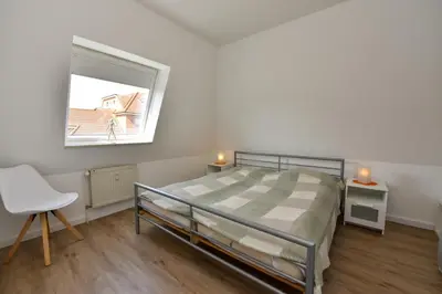 Ein Bett oder Betten in einem Zimmer der Unterkunft Haus 