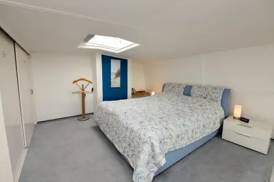 Ein Bett oder Betten in einem Zimmer der Unterkunft Haus 