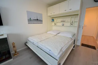 Ein Bett oder Betten in einem Zimmer der Unterkunft Haus 