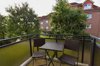 Ein Balkon oder eine Terrasse in der Unterkunft 