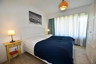 Ein Bett oder Betten in einem Zimmer der Unterkunft Haus 