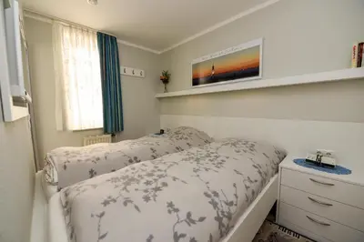 Ein Bett oder Betten in einem Zimmer der Unterkunft Appartementhaus 