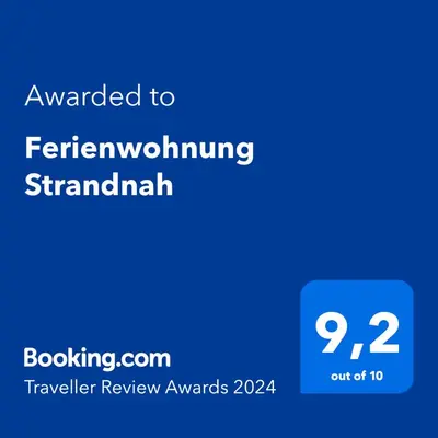 Ein Zertifikat, Auszeichnung, Logo oder anderes Dokument, das in der Unterkunft Ferienwohnung Strandnah ausgestellt ist