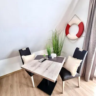 Ein Sitzbereich in der Unterkunft Haus Nordseeschatz Appartement 14 Sonnendeck