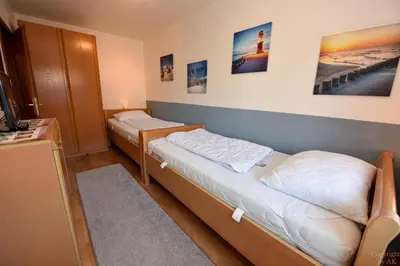 Ein Bett oder Betten in einem Zimmer der Unterkunft 