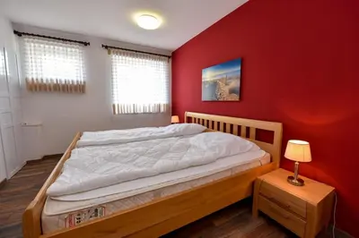 Ein Bett oder Betten in einem Zimmer der Unterkunft Haus 