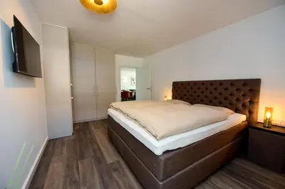 Ein Bett oder Betten in einem Zimmer der Unterkunft Haus 