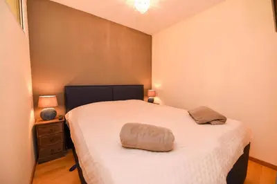 Ein Bett oder Betten in einem Zimmer der Unterkunft Haus 