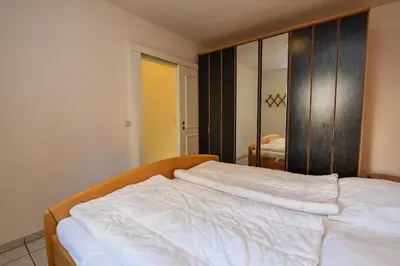 Ein Bett oder Betten in einem Zimmer der Unterkunft Haus 