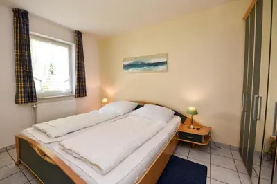 Ein Bett oder Betten in einem Zimmer der Unterkunft Haus 