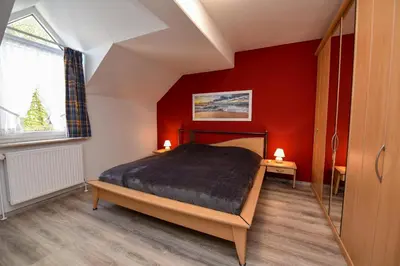Ein Bett oder Betten in einem Zimmer der Unterkunft Haus 