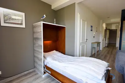 Ein Bett oder Betten in einem Zimmer der Unterkunft Haus 