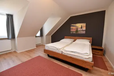 Ein Bett oder Betten in einem Zimmer der Unterkunft Haus 
