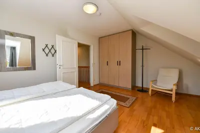 Ein Bett oder Betten in einem Zimmer der Unterkunft Haus 