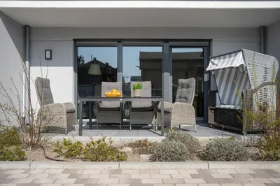 Ein Sitzbereich in der Unterkunft Haus Lütt Schick Apartment Feenja