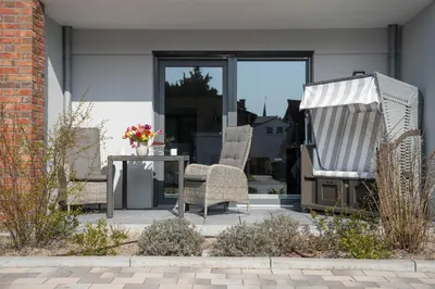 Ein Sitzbereich in der Unterkunft Haus Lütt Schick Apartment Feenja