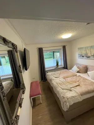 Ein Bett oder Betten in einem Zimmer der Unterkunft Haus Nordseeschatz Appartement 15 Große Schatzkiste 4 Personen