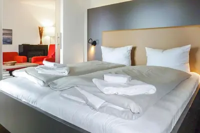 Ein Bett oder Betten in einem Zimmer der Unterkunft Resort Deichgraf Resort Deichgraf 27-06